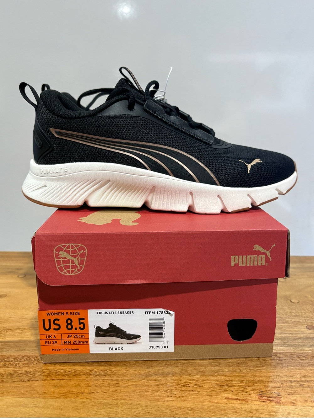 Puma Black and Rose Gold Focus Lite Sneaker Womens 8.5